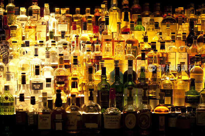 Various Liquor bottles backlit.